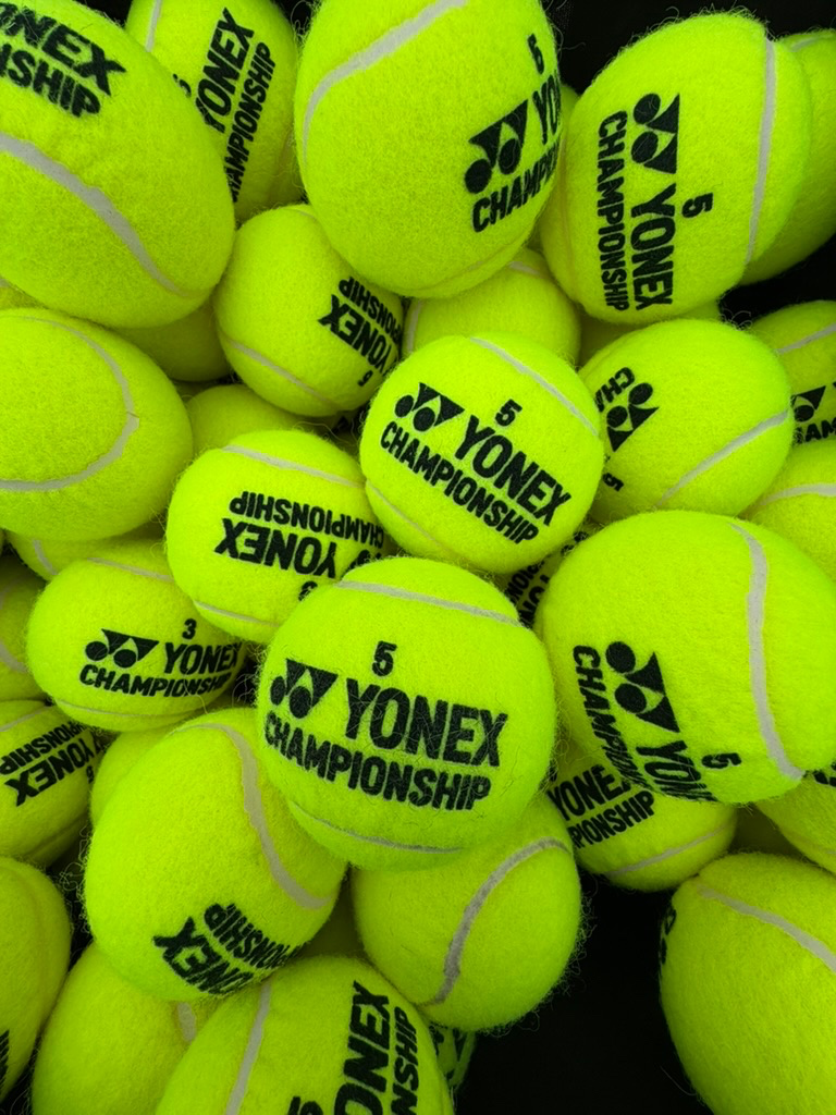 Fresh Yonex Championship tennis balls used in every session